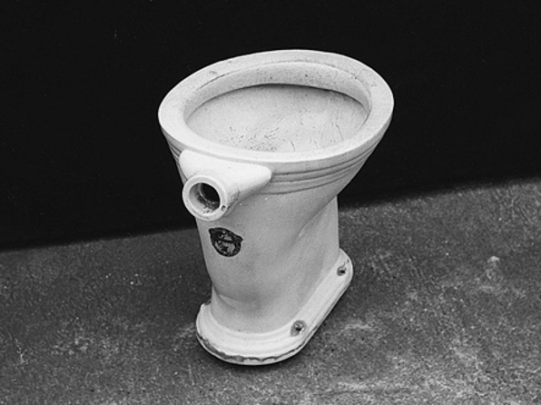 image of the first Japanese flush toilet in black and white