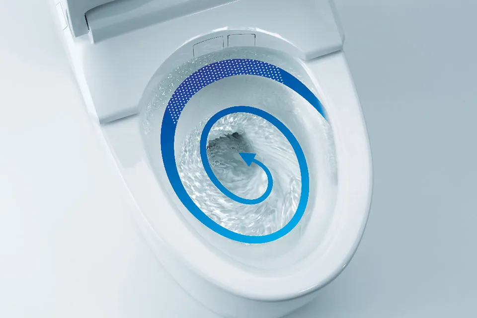 Top view of a TOTO toilet bowl with the TORNADO Flush’s water swirling 360 degrees to clean the entire bowl surface evenly.