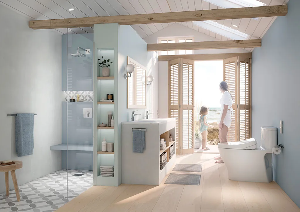 A TOTO Nexus WASHLET+ S7 Two-Piece Toilet is displayed in a beachfront family bathroom.