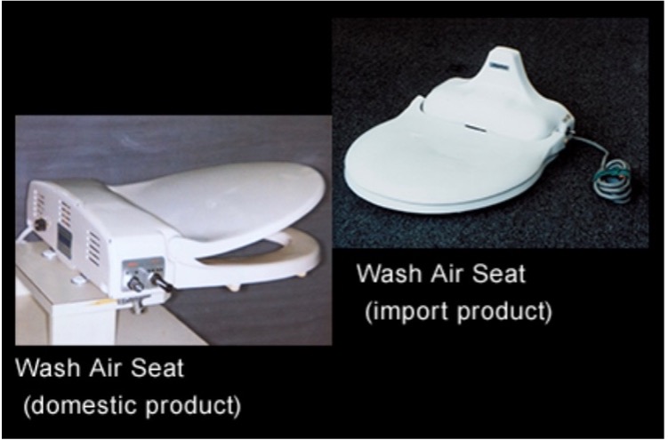 Two examples of the Wash Air Seat from the 1960s, one imported from the US, the other manufactured in Japan by TOTO.